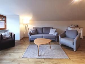 Posezení v ubytování Ferienwohnung Dorfplatz