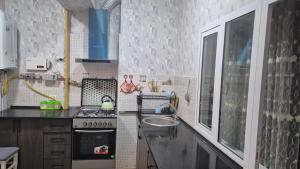 Kuchyň nebo kuchyňský kout v ubytování Apartments in Tashkent + 4 fotografie