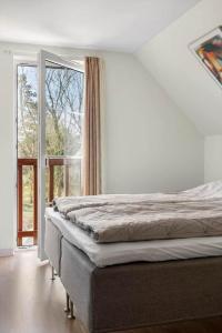 En eller flere senge i et værelse på 0207-Romo-Havnebyvej-59-F