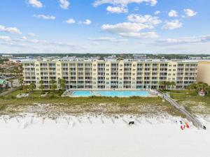 an aerial view of a large building on the beach at Waters Edge 504 - Direct Ocean Views - Free Beach Service in Fort Walton Beach