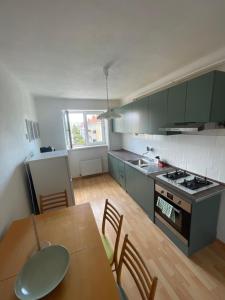 Η κουζίνα ή μικρή κουζίνα στο HUBA House