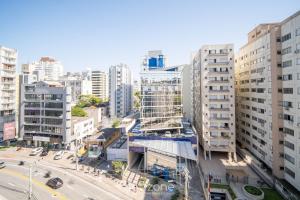 an aerial view of a city with tall buildings at OGD - Condominio com Piscina e Churrasqueira em Floripa in Florianópolis