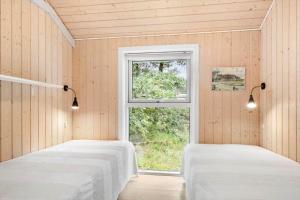 En eller flere senge i et værelse på 0262-Romo-Lyngvejen-67