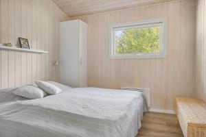 Postel nebo postele na pokoji v ubytování 0365-Romo-Dyssebjergvej-27