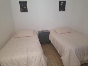 Ένα ή περισσότερα κρεβάτια σε δωμάτιο στο Apartamento LEO-BEL