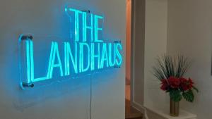 a neon sign that says the laminates on a refrigerator at Downtown Cleveland- Steps to Sports & Events condo in Cleveland