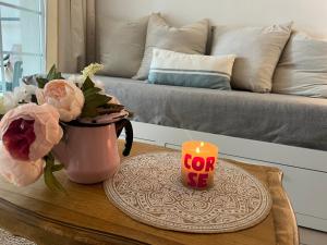 Et opholdsområde på Joli appartement au golf