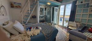 a bedroom with a bed with two stuffed animals on it at B&B Vista Mare in Crotone