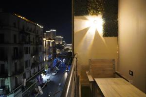 a balcony with a light on the side of a building at Midtown Studio near Tahrir in Cairo