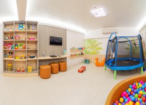 a room with a play room with a trampoline at Crocobeach Hotel in Fortaleza +30 photos