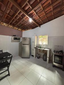 Køkken eller tekøkken på Chalé Minas - Feminino