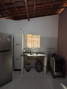 Køkken eller tekøkken på Chalé Minas - Feminino