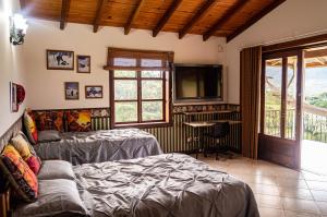 Un pat sau paturi într-o cameră la Casa Finca Los Pinos Tia Nora +50 fotografii