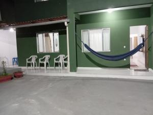 Μπαλκόνι ή βεράντα στο Casa pousada verde Guarapari