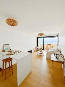 Katil atau katil-katil dalam bilik di Appartement LACANAU avec vue sur l'ocean 2 ou 4 personnes