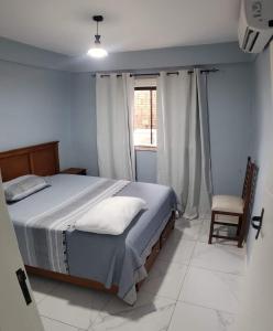 Postel nebo postele na pokoji v ubytování Alicia Hospedaje3