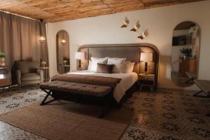 Ένα ή περισσότερα κρεβάτια σε δωμάτιο στο Casa Frida