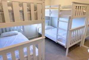 Ένα ή περισσότερα κρεβάτια σε δωμάτιο στο The Lake House