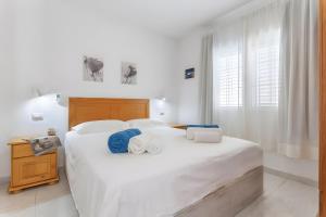 En eller flere senge i et værelse på La Casita Serenada + 21 billeder