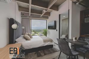 Μια τηλεόραση ή/και κέντρο ψυχαγωγίας στο Epic Suite 302 Deluxe Aeropuerto +10 φωτογραφίες