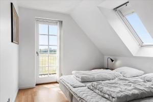 Giường trong phòng chung tại 0368-Romo-Vestergade-407