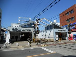 an intersection in a city with a traffic light at Stay Like Living IJIRI 103 in Shiobaru