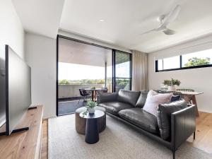 Χώρος καθιστικού στο Margaret's Luxe Apartment