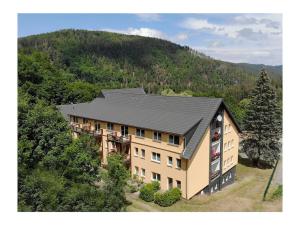 an aerial view of a house in the mountains at Schwarzatal meadow view in Schwarzburg