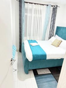 Katil atau katil-katil dalam bilik di Greenzone Apartment +5 gambar