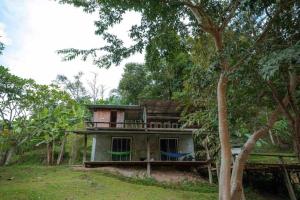 a house in the middle of the forest at Le Cher campsite & homestay in Ban Yang Huai Tong