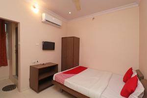 Ένα ή περισσότερα κρεβάτια σε δωμάτιο στο Hotel O Steel City