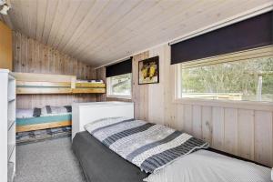 Ένα ή περισσότερα κρεβάτια σε δωμάτιο στο 0143-Romo-Ejnar-Mikkelsensvej-11