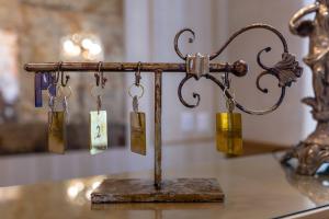 a metal item with tags on it on a table at Hotel Embajada in San Luis Potosí +72 photos