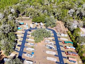 an aerial view of a parking lot with buses at Luxury Cabin #11 in Ocala +2 photos