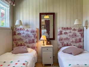 Ένα ή περισσότερα κρεβάτια σε δωμάτιο στο 4 person holiday home in ELLÖS-By Traum