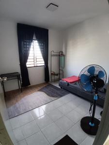 Χώρος καθιστικού στο Syaza Haven Homestay