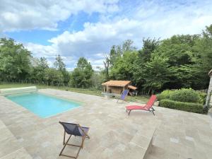 Πισίνα στο ή κοντά στο Charmant gîte en pierre avec piscine chauffée, proche Périgueux - FR-1-616-480