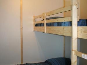 Palanda nebo palandy na pokoji v ubytování Chalet 5 pers avec terrasse à Ribes - API-1-52-661