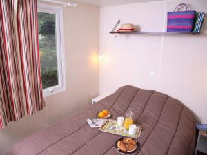 Χώρος καθιστικού στο Mobil-home Confort avec Terrasse 2 Ch - 4 Pers - API-1-52-579
