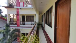 a view of the balcony of a house at Pring Pension House Puerto Princesa in Puerto Princesa City +54 photos