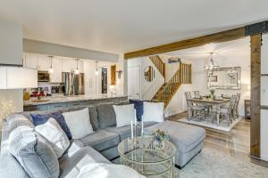 a living room with a couch and a table at Hike, Ski and Golf Fully Renovated Edwards Townhome in Edwards