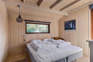 Giường trong phòng chung tại 15502-Farevejle-Lyngbakken-12