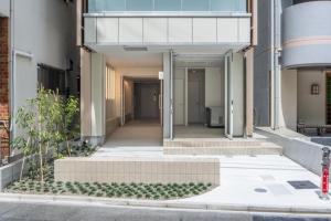 a hallway of a building with a walk way at MN Building - Vacation STAY 11194 in Nagoya