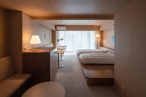 Ένα ή περισσότερα κρεβάτια σε δωμάτιο στο MN Building - Vacation STAY 11197