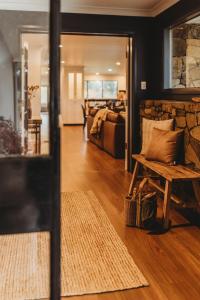 Χώρος καθιστικού στο Tussock Lodge Snowy Mountains