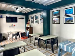 TV a/nebo společenská místnost v ubytování Neptune Diving Resort Moalboal