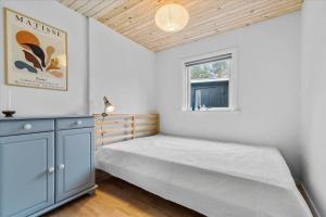 Postel nebo postele na pokoji v ubytování 84172-Ebeltoft-Birkevej-24