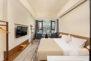 Gallery image of 云隐兮江景民宿 in Fenghuang