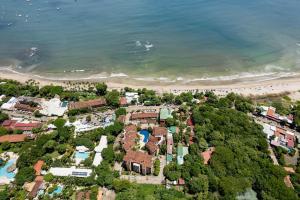 an aerial view of a resort and the beach at Sunrise 7 - 2 Bedroom, Ocean View Condo in Tamarindo