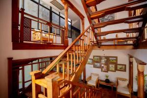 an overhead view of a wooden staircase in a house at Laavanya Inn in Pokhara